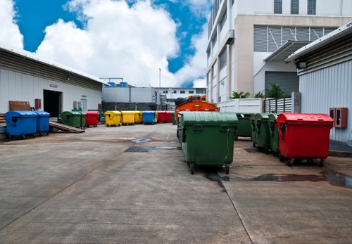 Company team and rubbish collection trucks representing anti-slavery commitment